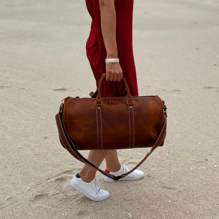 brown leather duffle bag